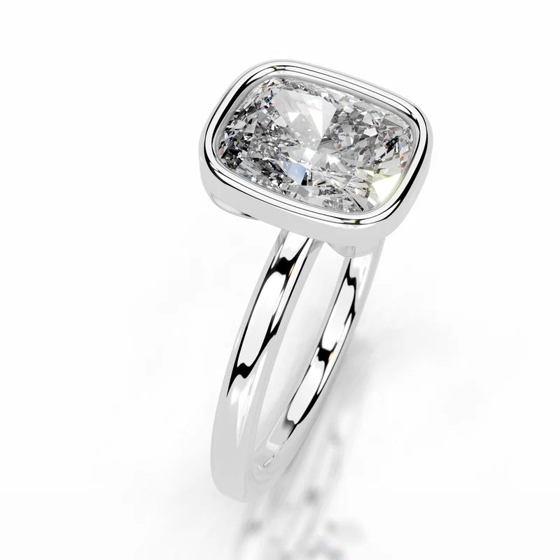 White :: Elongated cushion bezel set lab grown diamond engagement ring elegant style