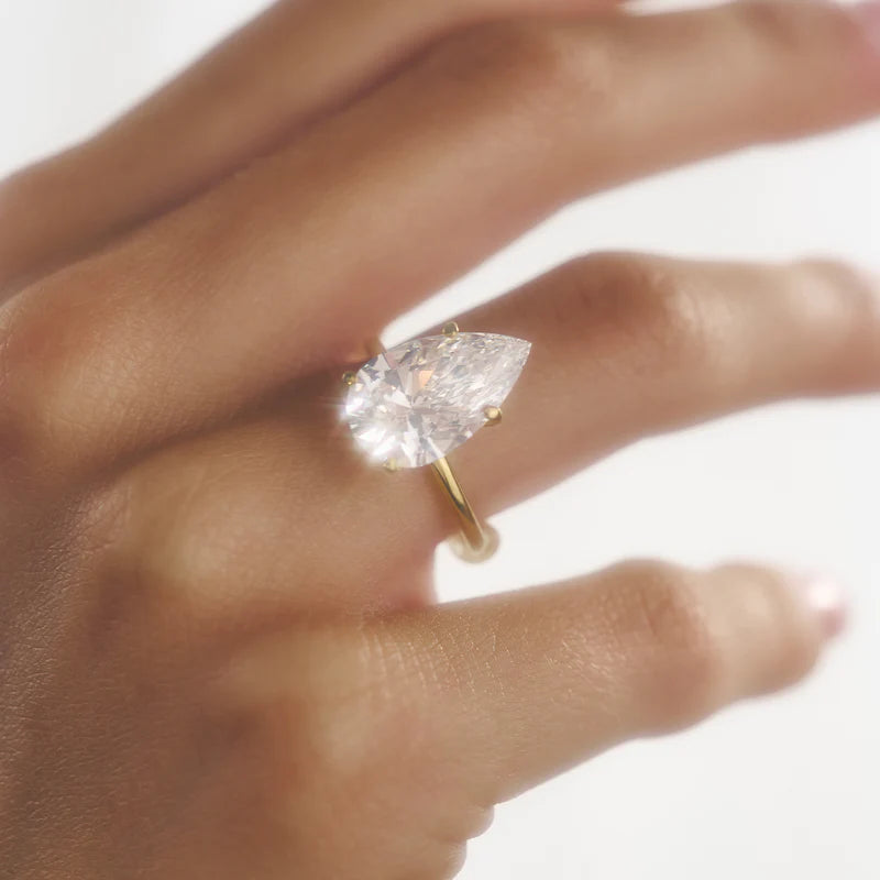 Yellow :: sustainable pear lab grown diamond engagement ring hidden halo design