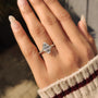 Common :: Romantic botanical engagement ring with a marquise center diamond surrounded by leaf-shaped diamond details.