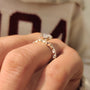 Common :: Elegant marquise cut diamond engagement ring designed with floral motifs and sustainable lab grown diamonds.