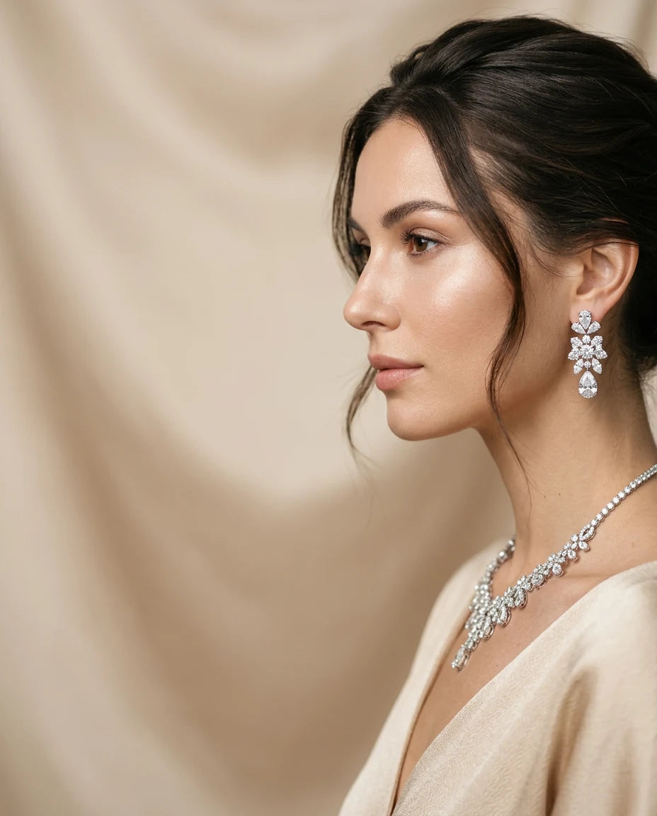 Woman wearing lab grown diamond statement earrings and necklace – Unii Jewels