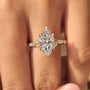 Common :: Luxury bridal ring with a marquise lab grown diamond center stone and sparkling botanical side diamonds.