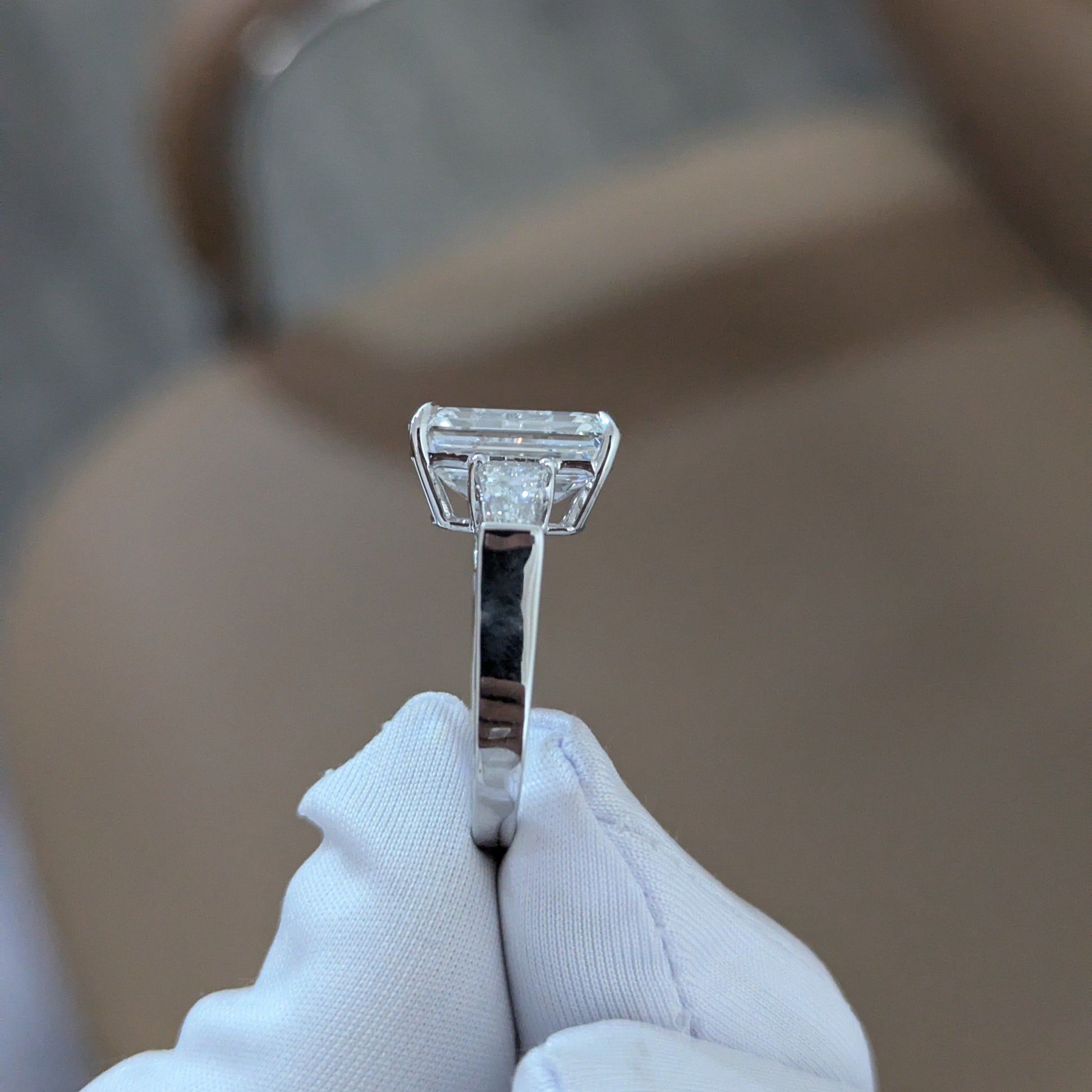 Emerald 5.80tcw Lab Diamond Three Stone Ring | IGI Certified | Tapered Baguette Side Stones