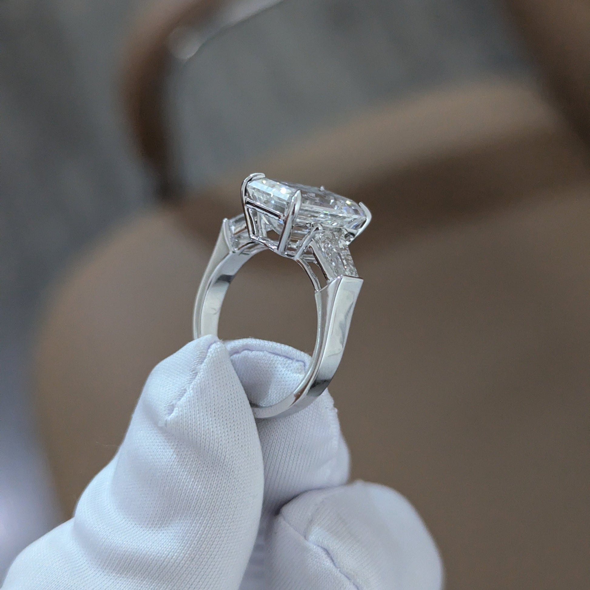 Emerald 5.80tcw Lab Diamond Three Stone Ring | IGI Certified | Tapered Baguette Side Stones