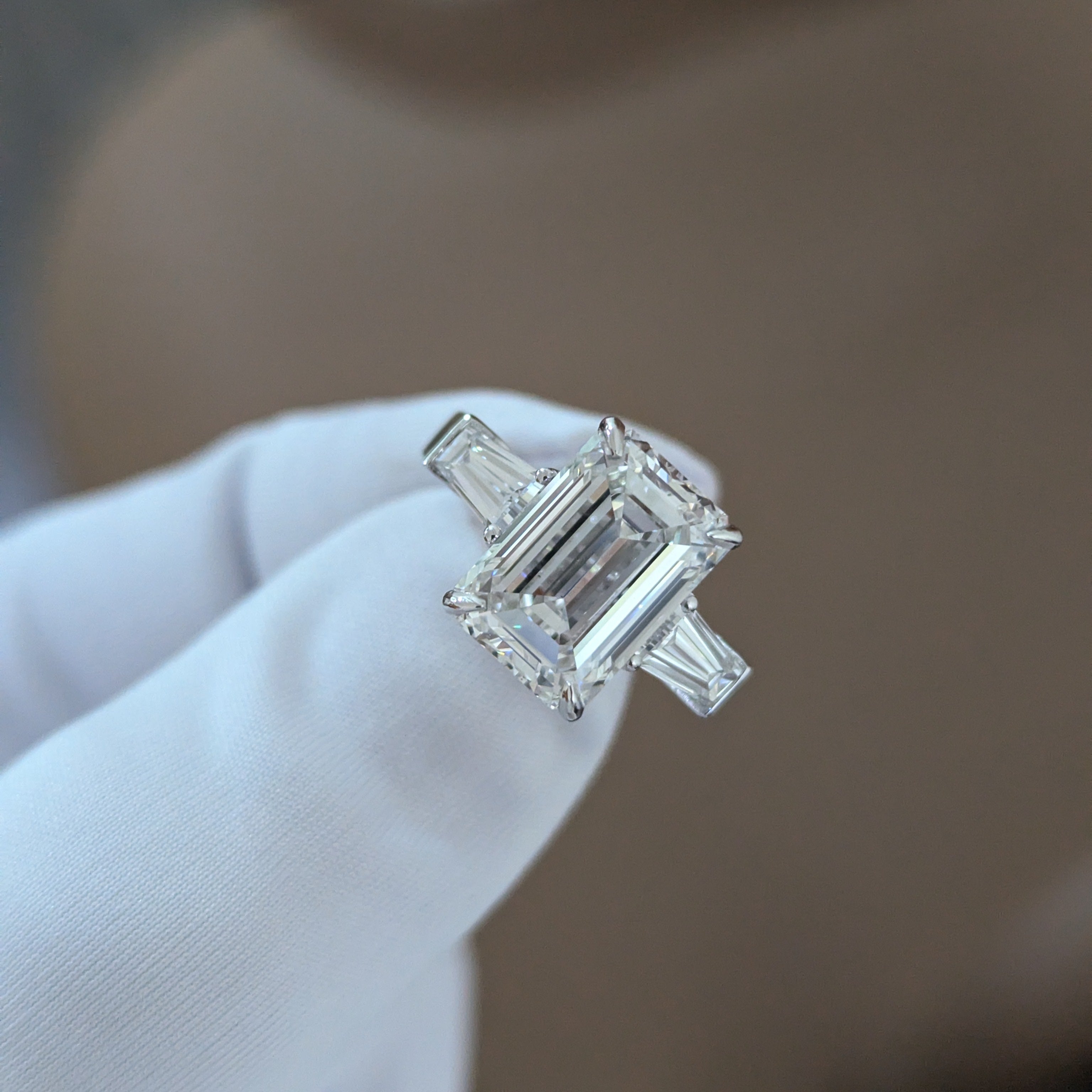 Emerald 5.80tcw Lab Diamond Three Stone Ring | IGI Certified | Tapered Baguette Side Stones