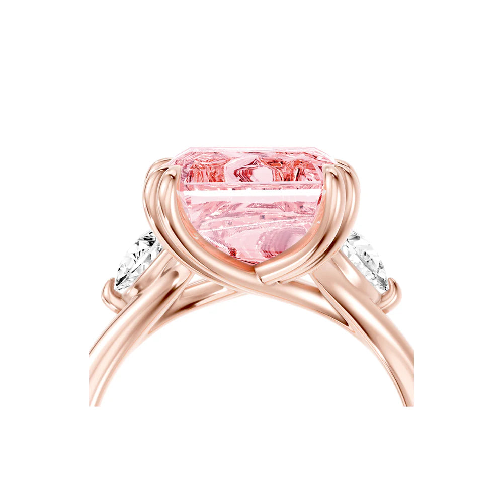 Common :: close up 10 carat pink emerald diamond engagement ring three stone design