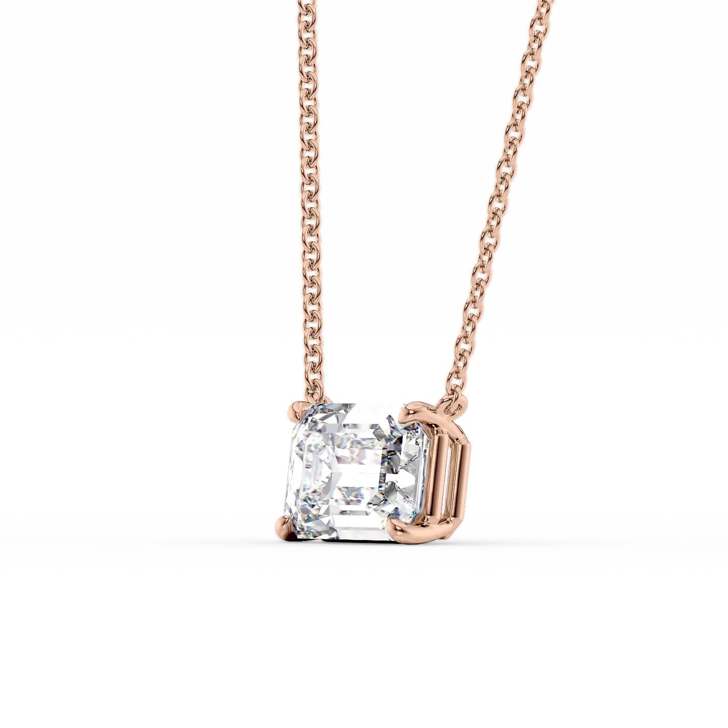 rose :: 0.5 carat emerald solitaire necklace with romantic rose gold finish