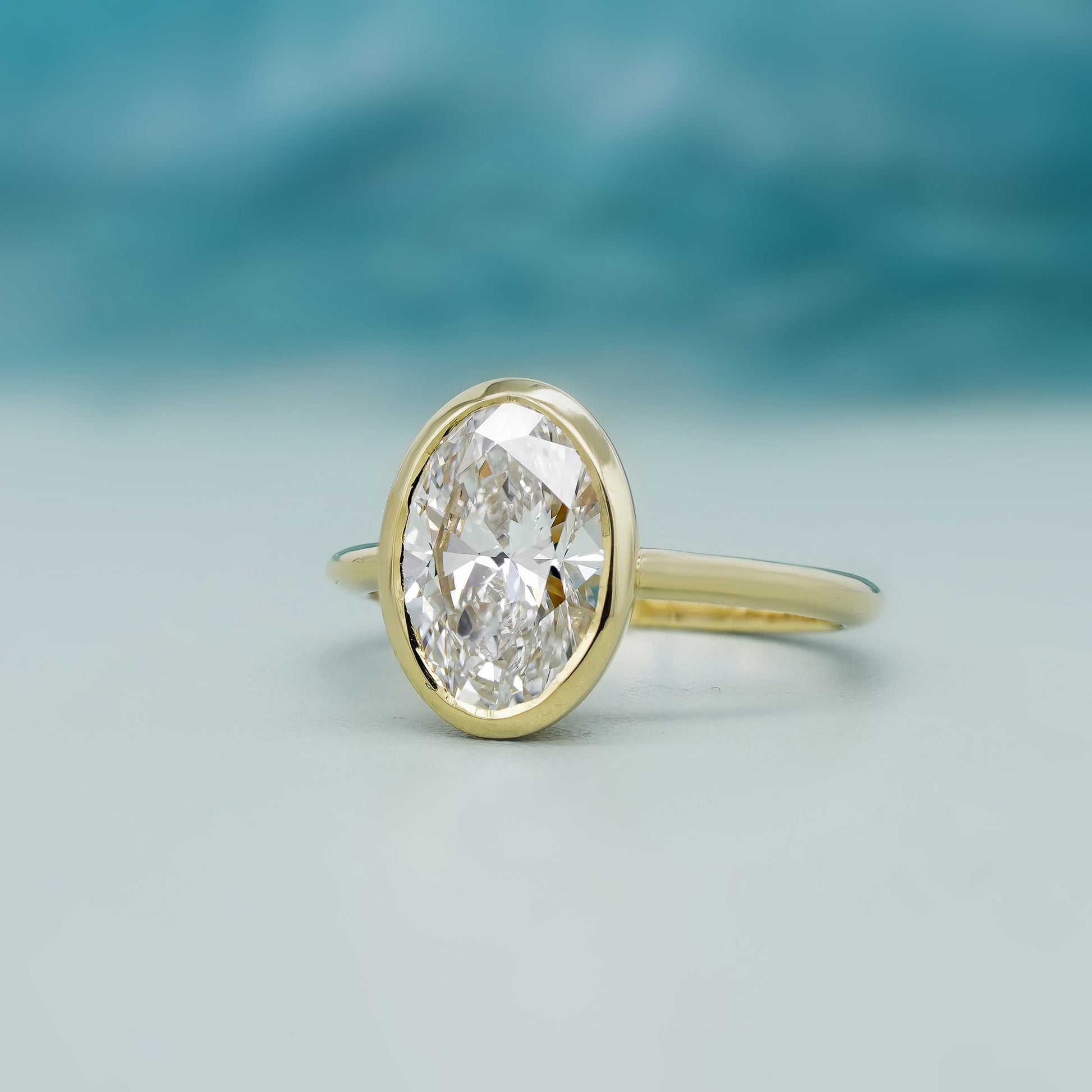 Oval Cut 2.00Carat Lab Diamond Engagement Ring | Bezel Setting in Yellow Gold | D-E-F Color, VVS–VS Clarity