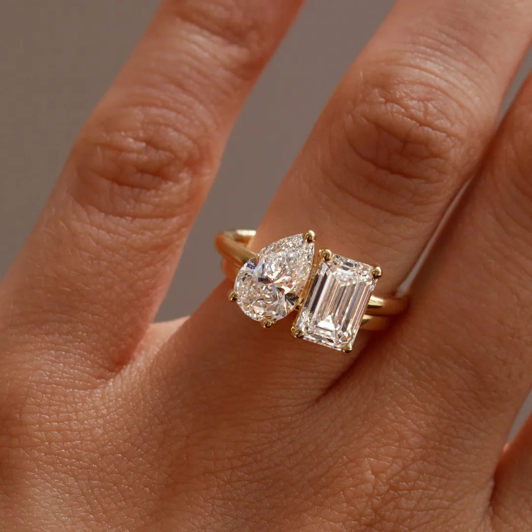 Common :: 18K yellow gold Toi Et Moi ring with D color VVS2 lab grown diamonds.