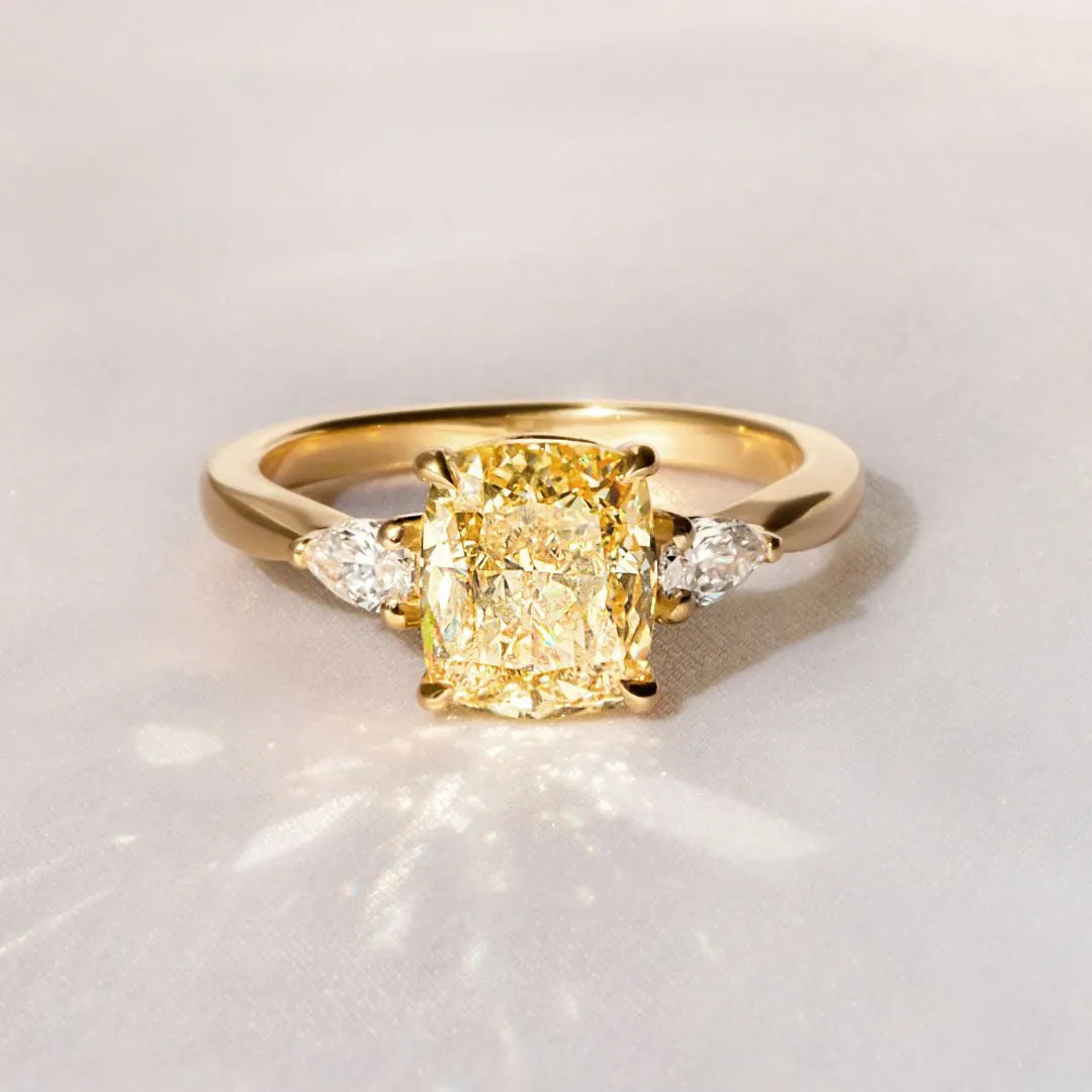 Common :: Oraviquea 3.15ct yellow elongated cushion three stone lab grown diamond engagement ring IGI certified