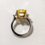 Common :: close up 5 carat yellow square emerald diamond engagement ring three stone design