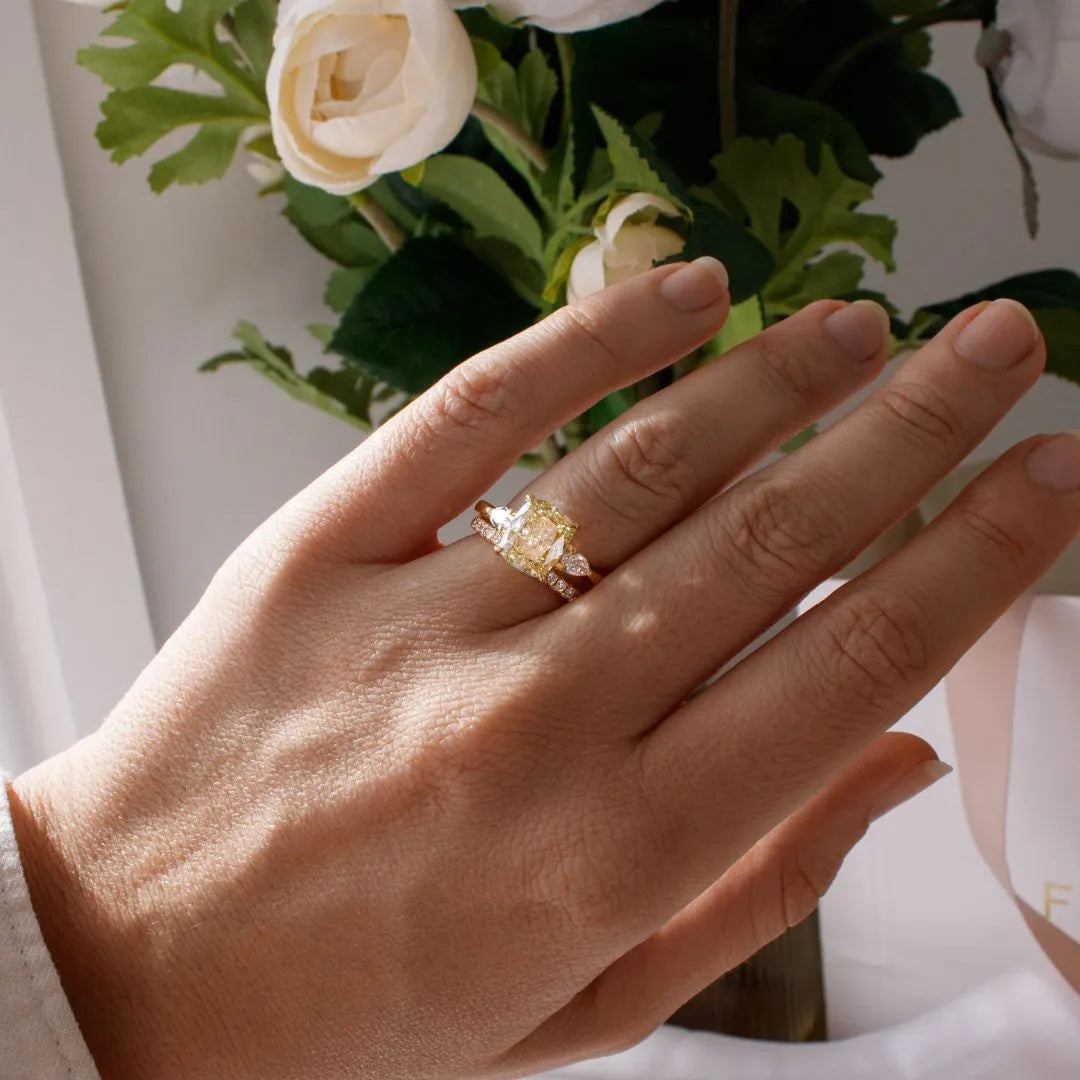 Common :: yellow elongated cushion lab grown diamond three stone engagement ring luxury yellow diamond ring