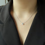 white :: sophisticated white gold solitaire pendant designed for modern women