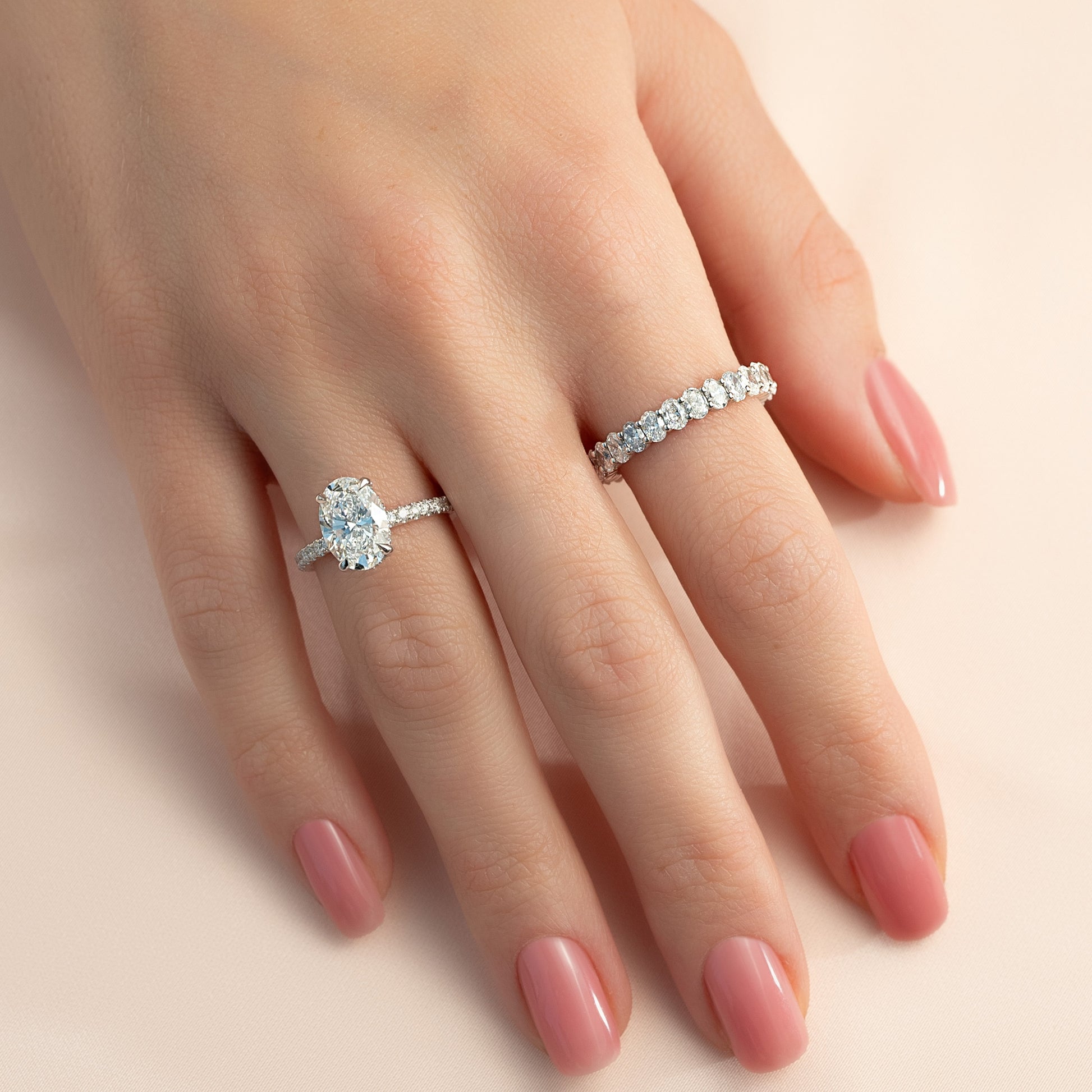 White :: 2 carat oval lab grown diamond eternity ring white gold full diamond band