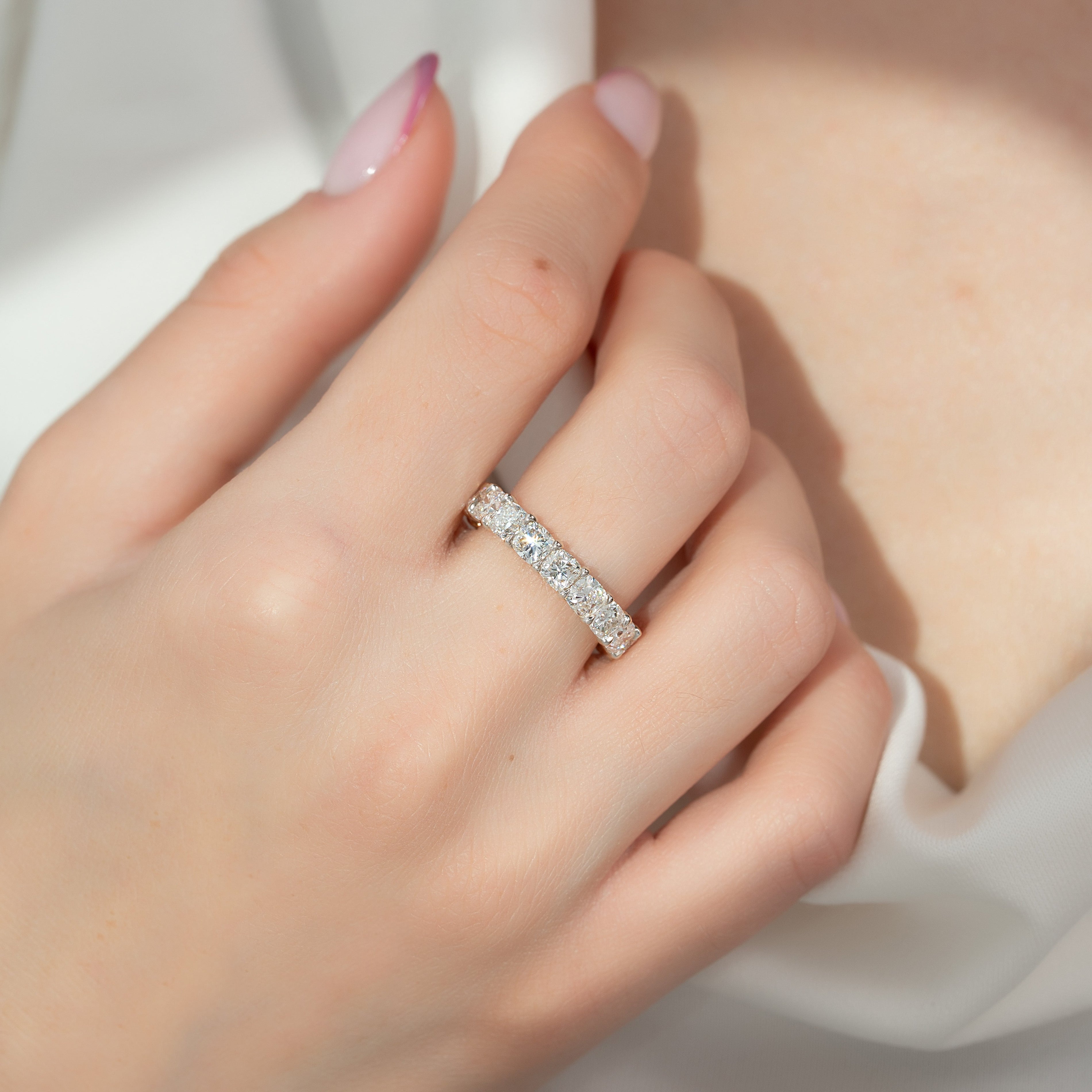 White :: 5 carat cushion cut lab grown diamond eternity ring white gold full diamond band