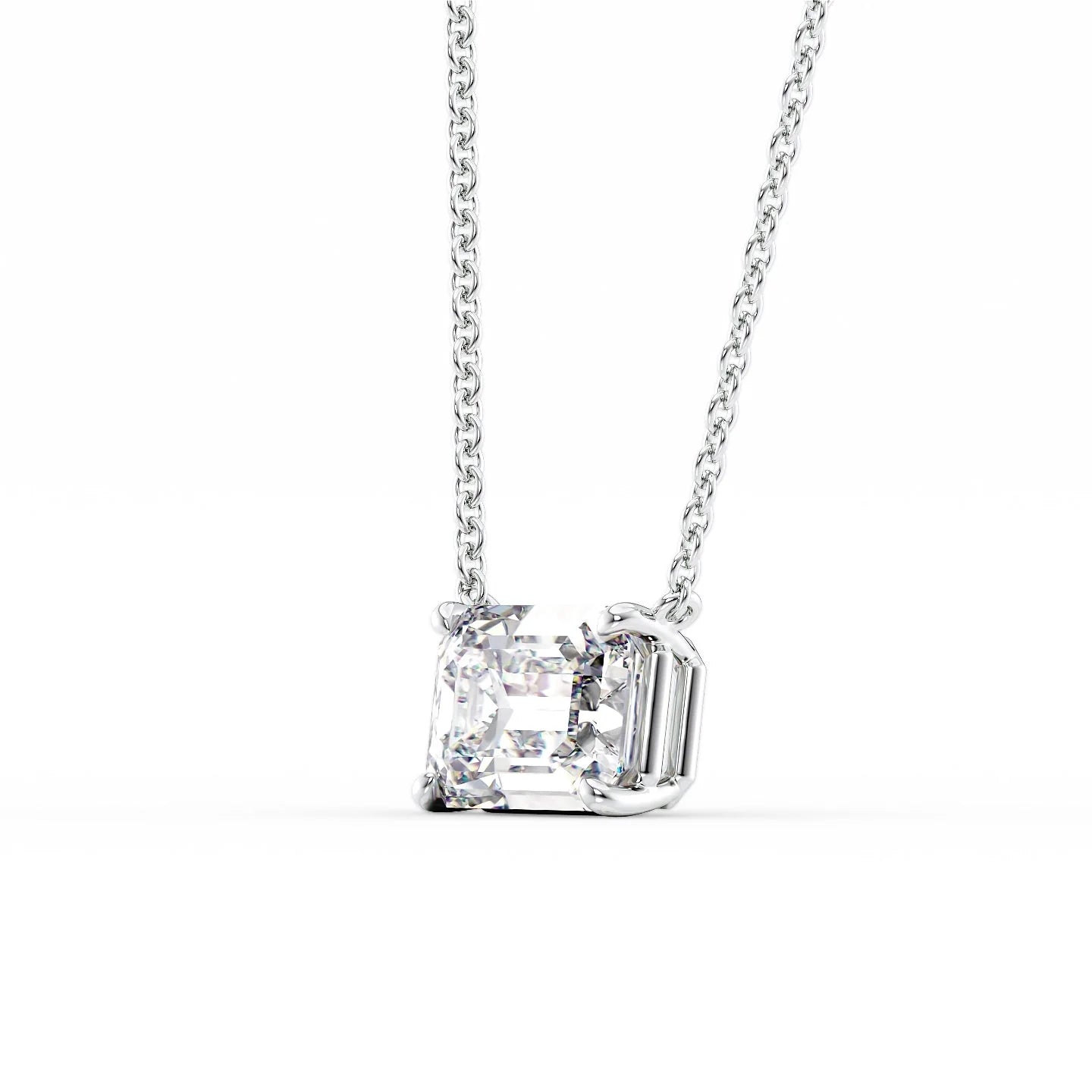 white :: 0.8 ct emerald solitaire pendant with polished white gold finish