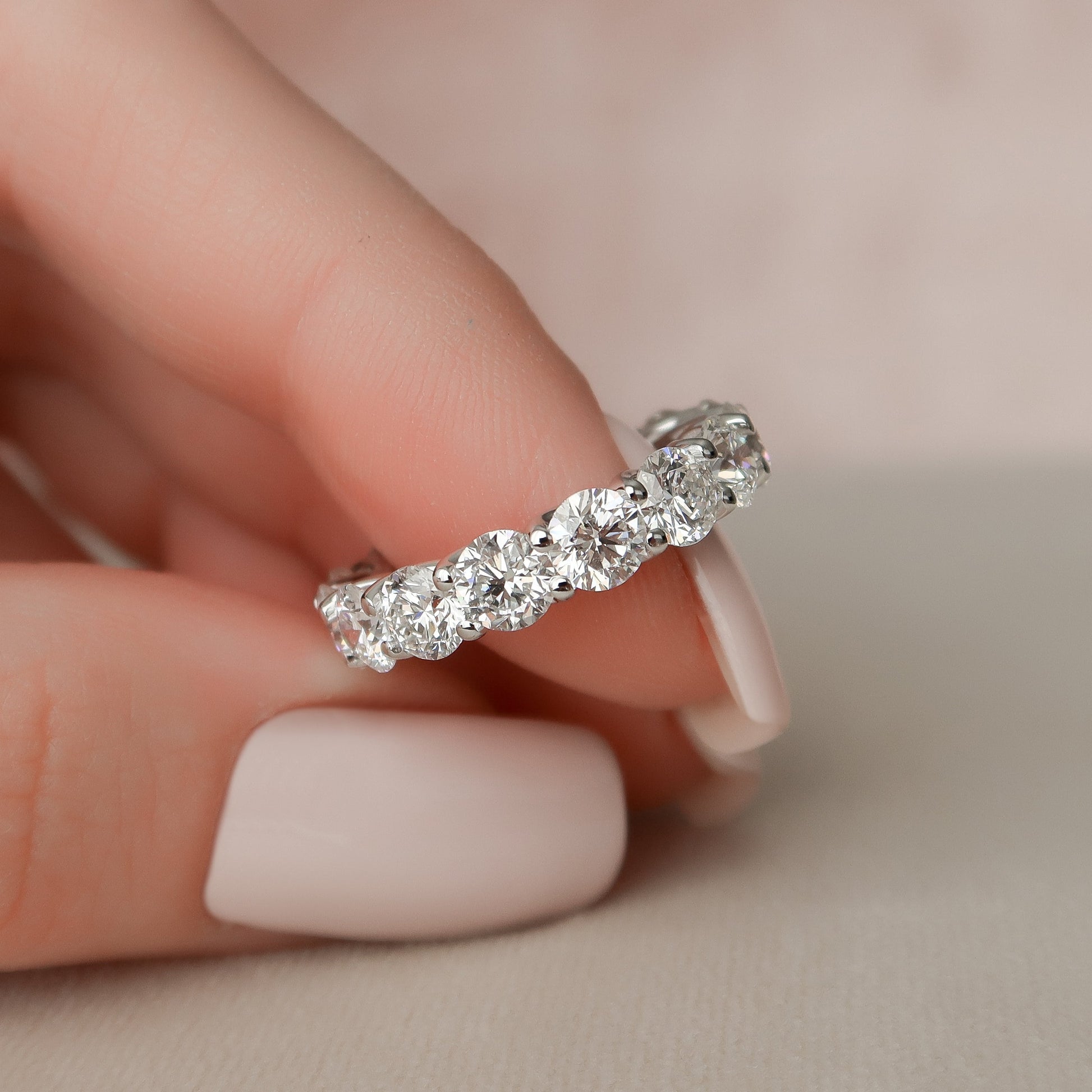 White :: IGI certified 4.5ct round lab diamond eternity ring white gold trellis setting band