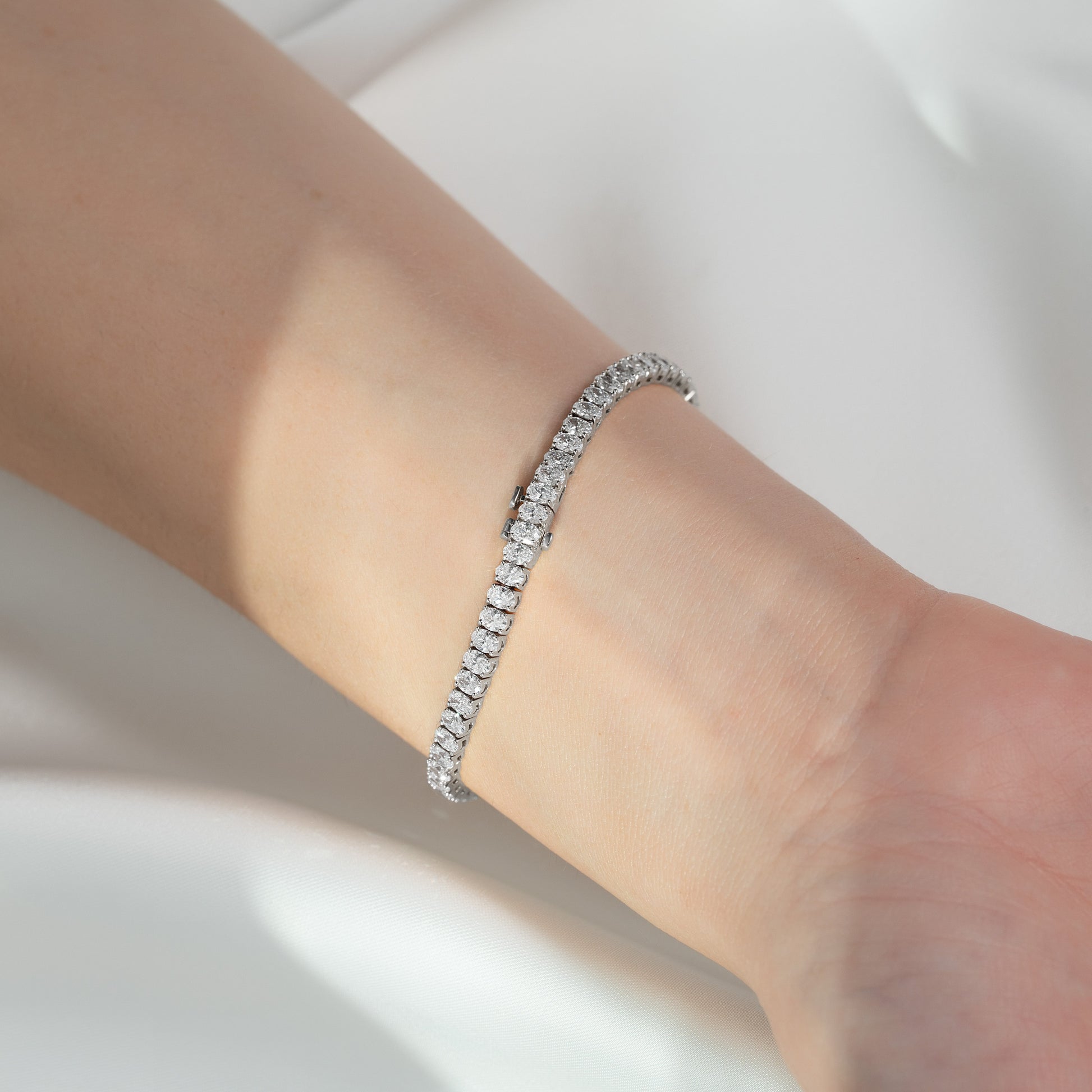 white :: 6 carat fine jewelry oval diamond bracelet prong set