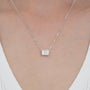 white :: 1 carat emerald cut diamond necklace featuring elegant brilliance