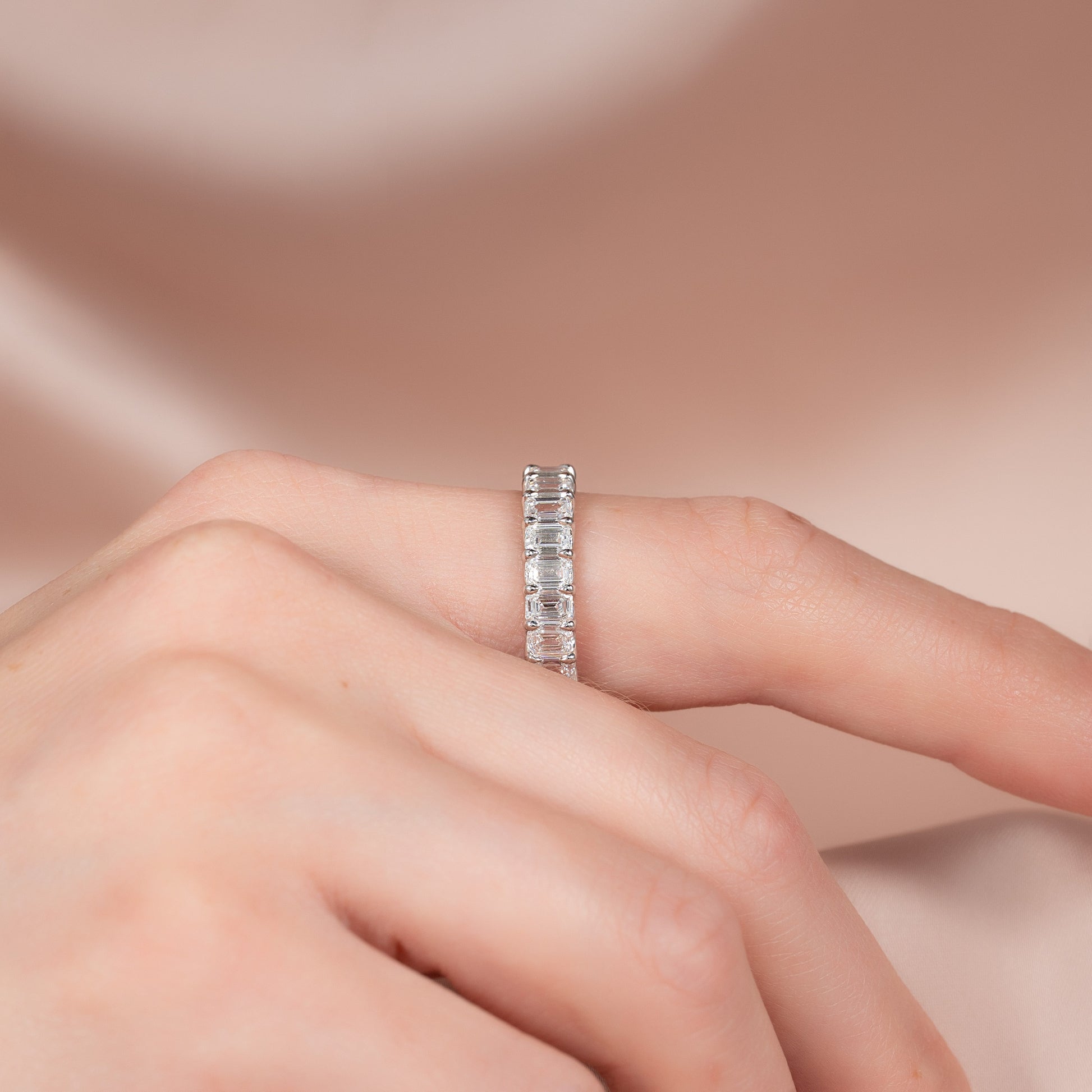 White :: close up 5ct emerald u prong lab grown diamond eternity ring white gold step cut brilliance