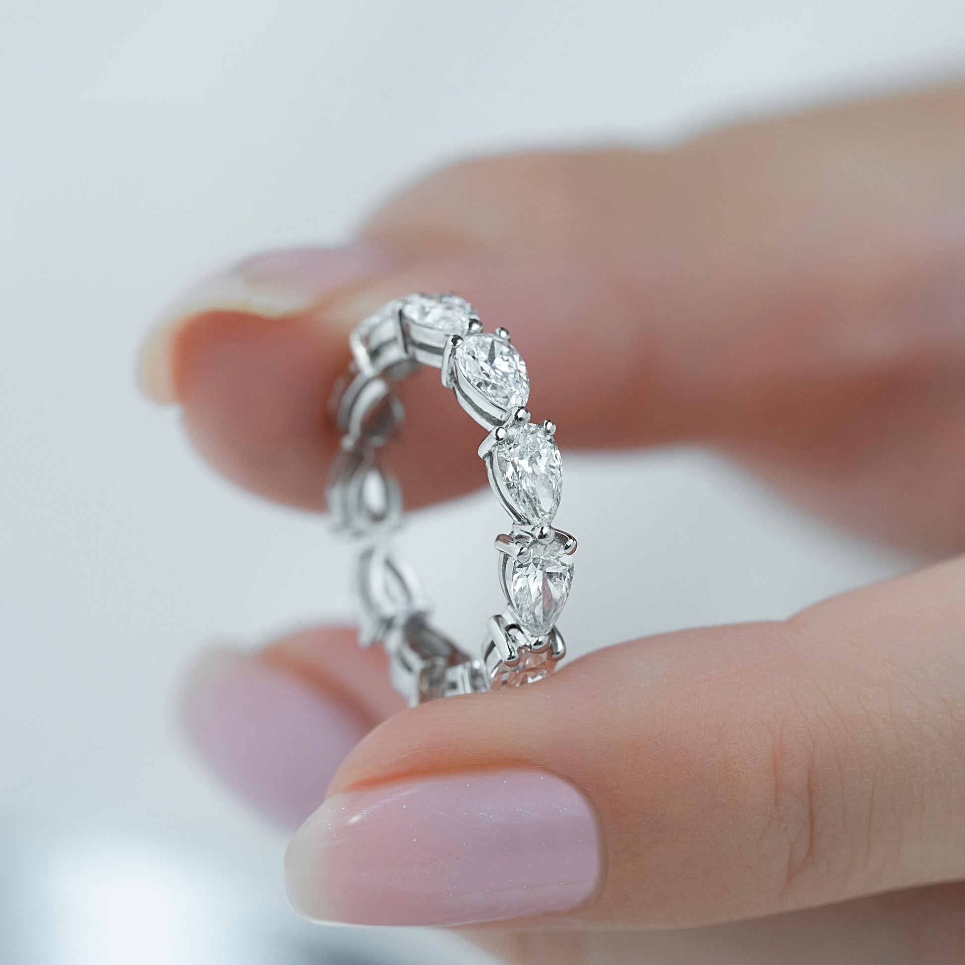 White :: elegant 3 carat pear east west lab grown diamond eternity ring white gold sleek design