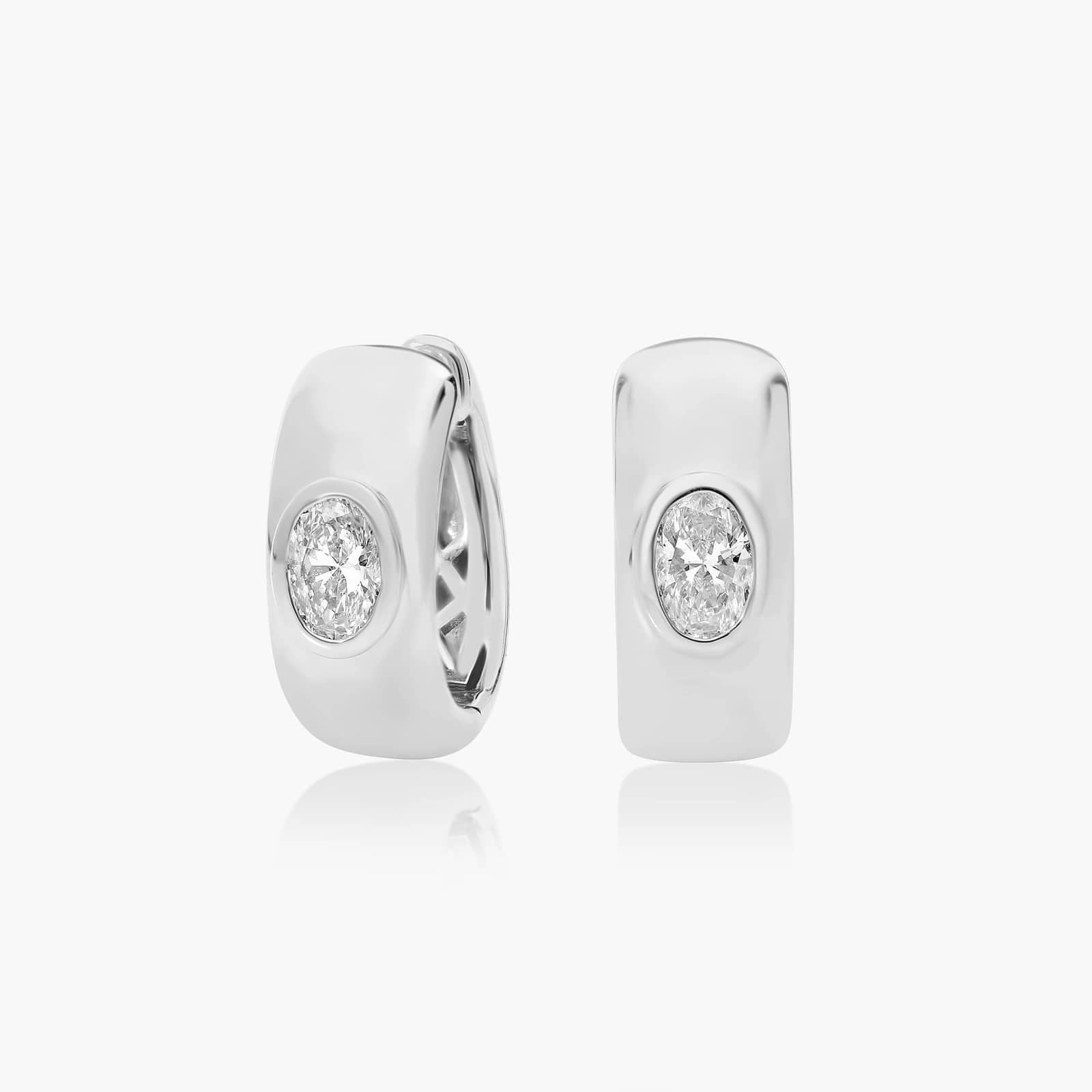 White :: oval bezel lab grown diamond huggie hoop earrings elongated design white gold minimal elegant fine jewelry