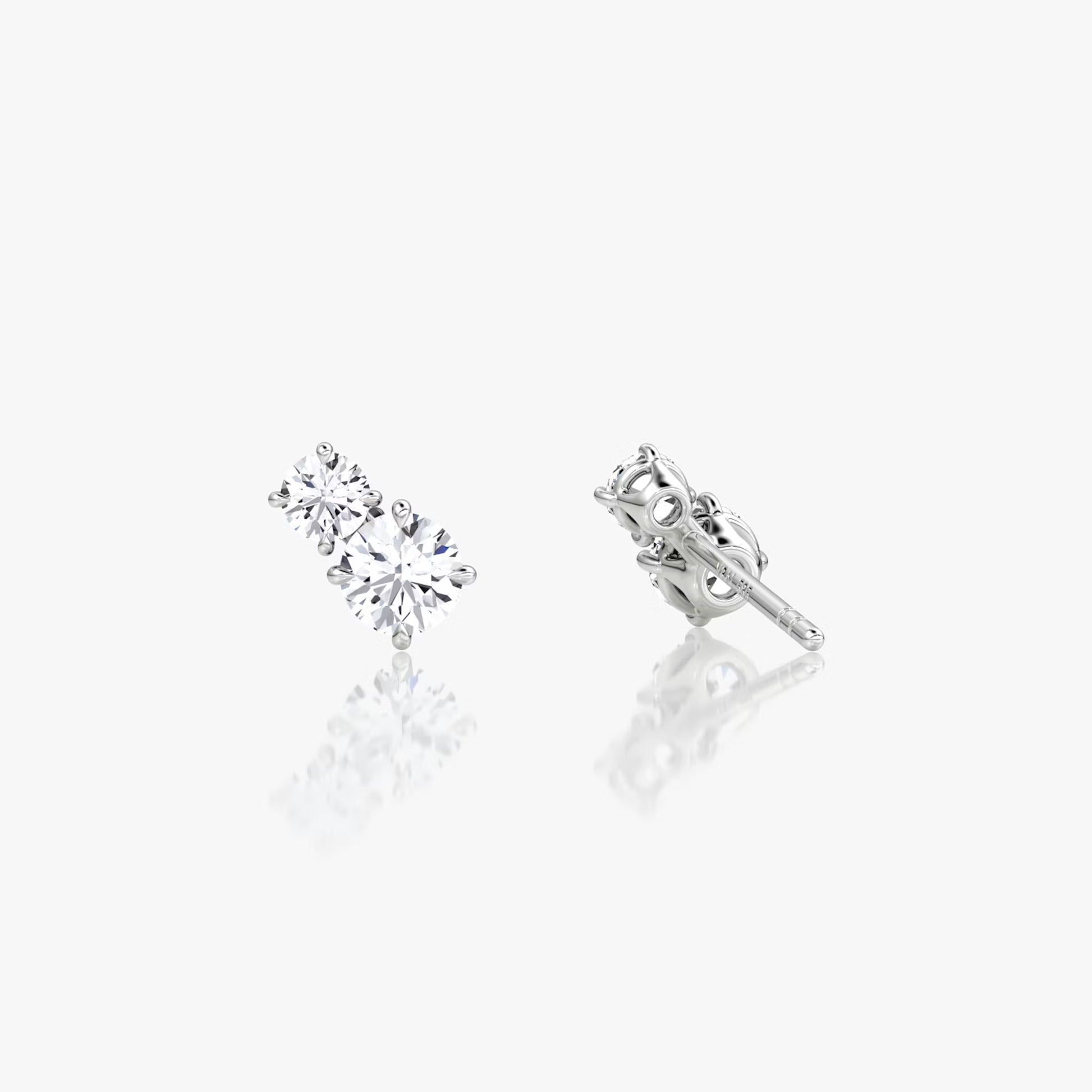 White :: elegant three stone lab grown diamond earrings huggie style white gold modern fine jewelry