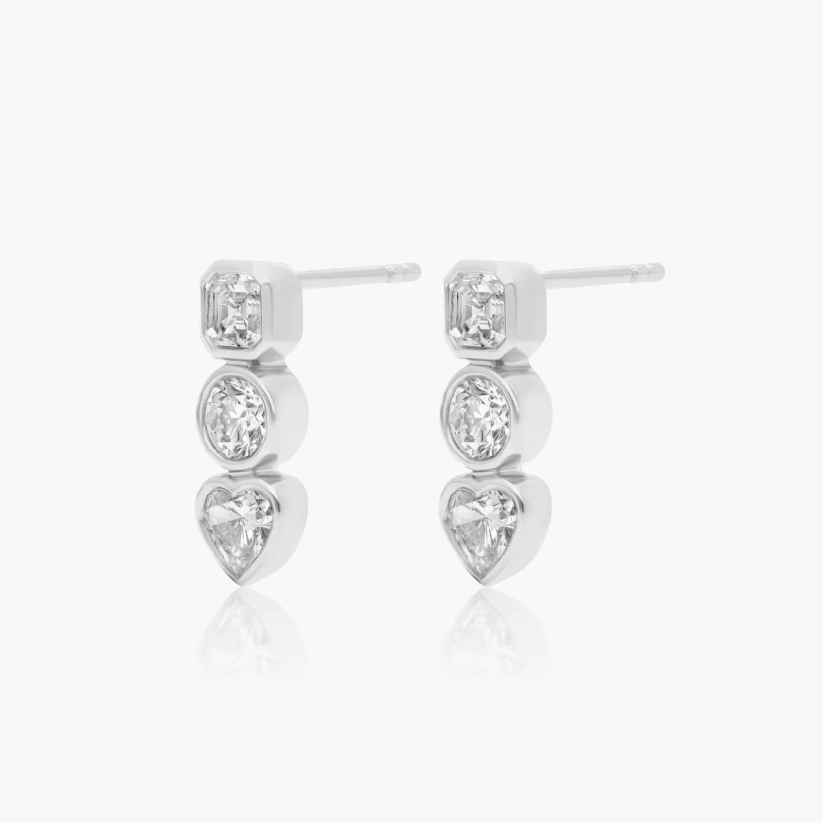 White :: bezel set multi shape lab grown diamond studs mixed cut design white gold unique luxury jewelry