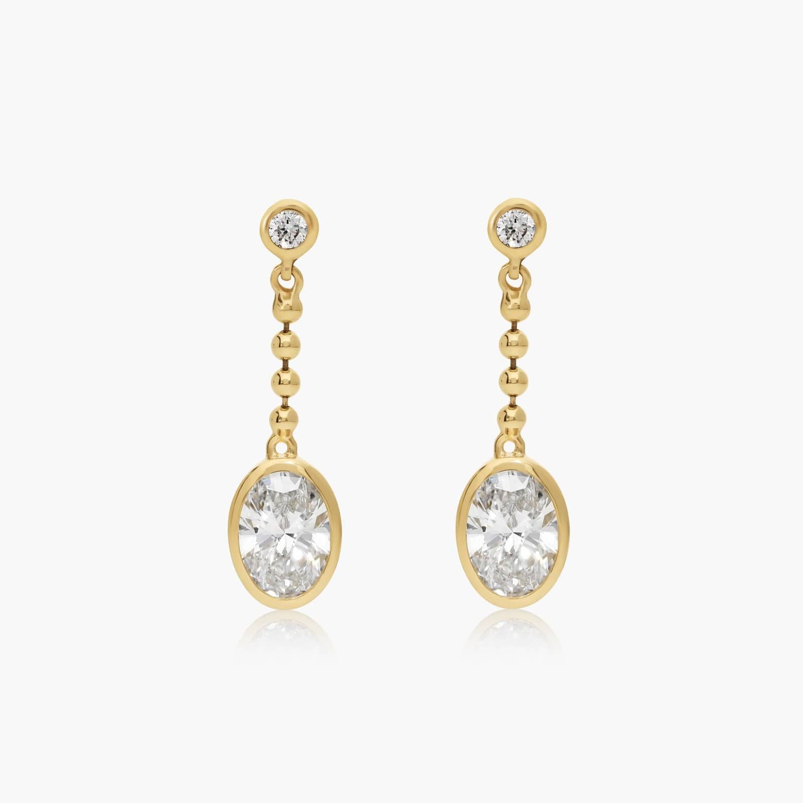 Common :: oval shape lab grown diamond bezel chain drop earrings elongated design white gold elegant fine jewelry