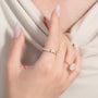 Yellow :: IGI certified 1.4ct oval lab grown diamond east west bezel eternity ring yellow gold full band
