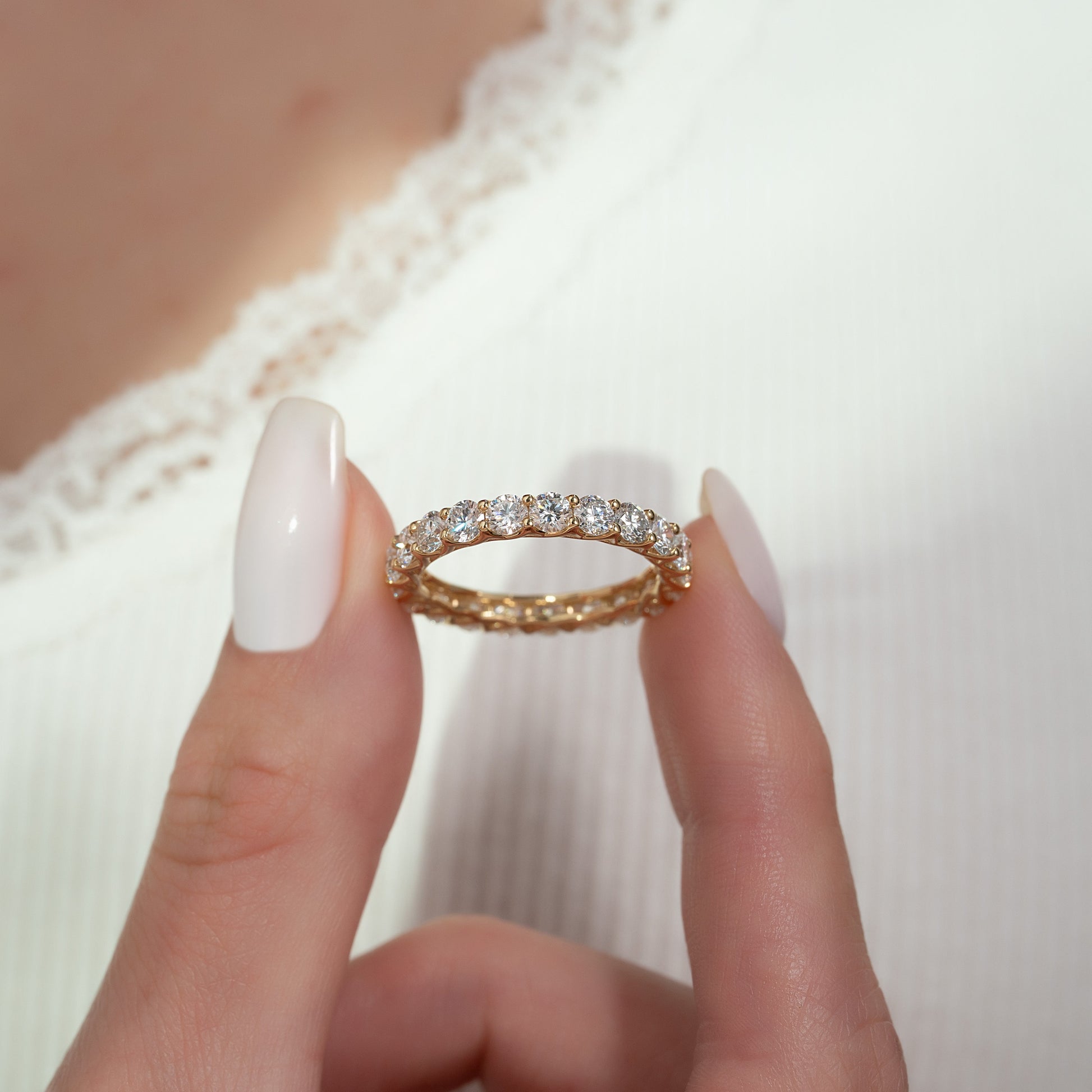 Yellow :: IGI certified 3ct round lab grown diamond eternity ring yellow gold trellis setting