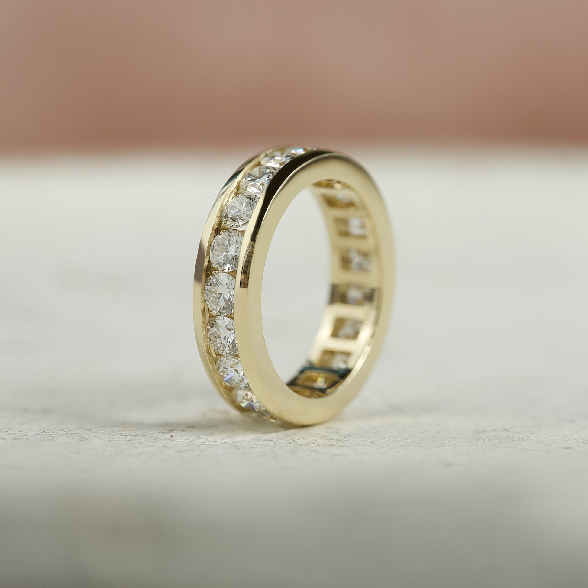 Yellow :: IGI certified 2ct round lab grown diamond eternity ring yellow gold channel setting