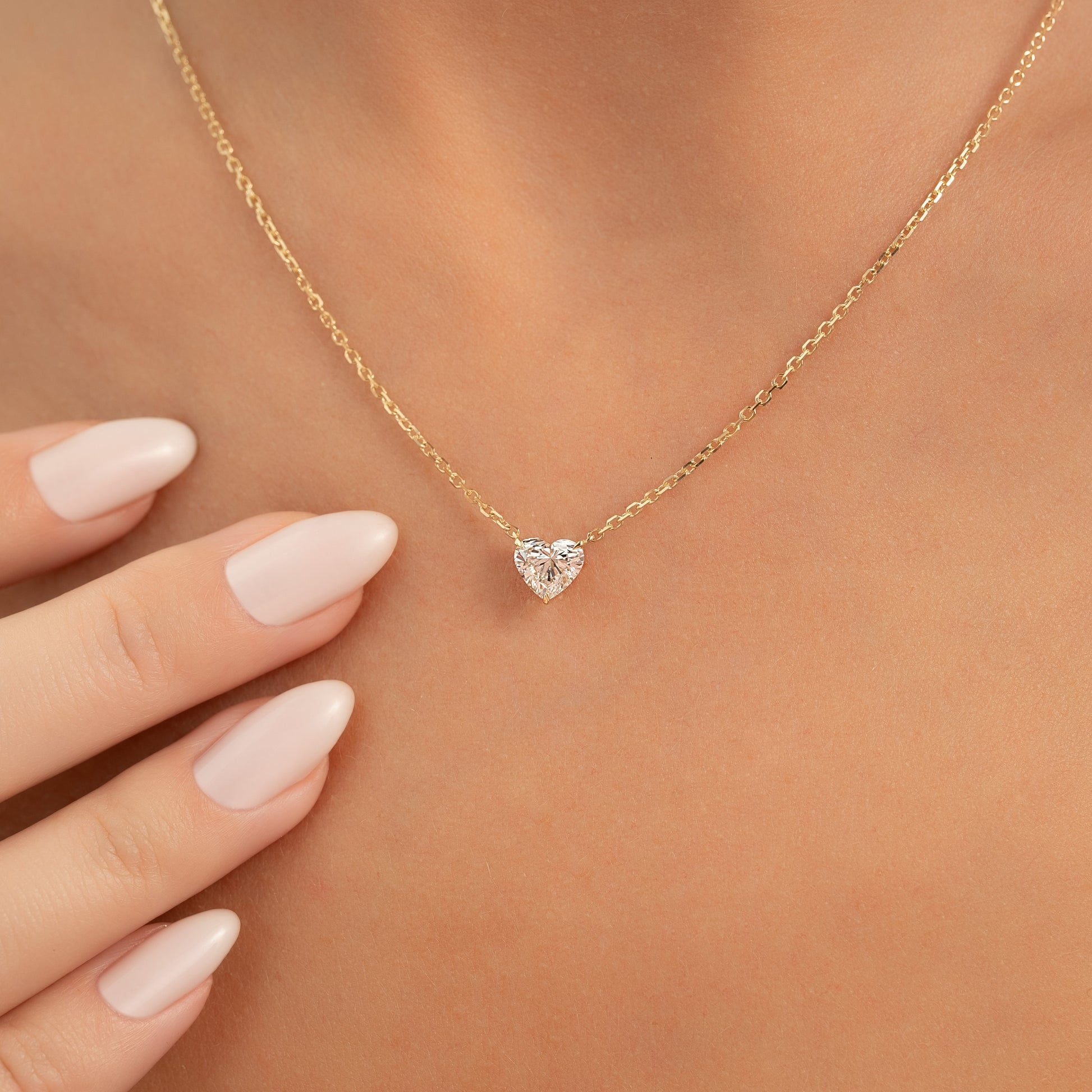 yellow :: elegant 0.8 ct heart solitaire necklace with warm gold tones