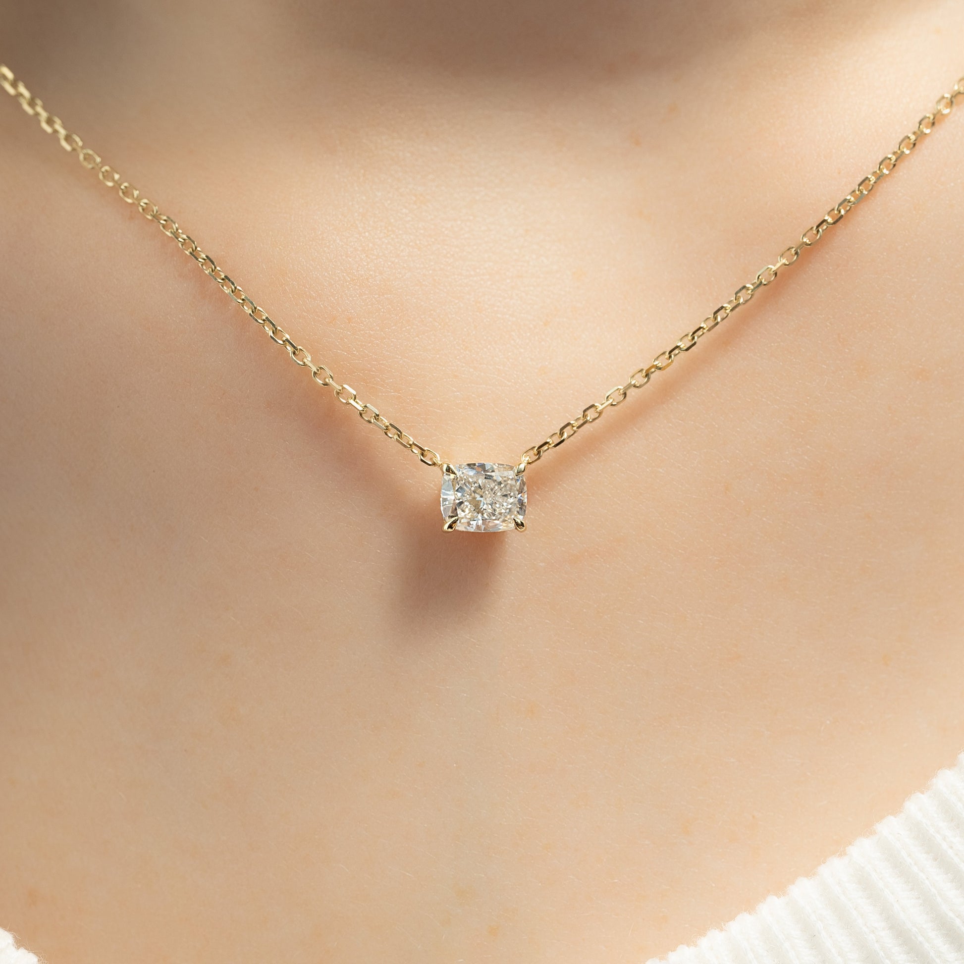 yellow :: 1.5 ct elongated cushion shaped diamond pendant crafted in yellow gold
