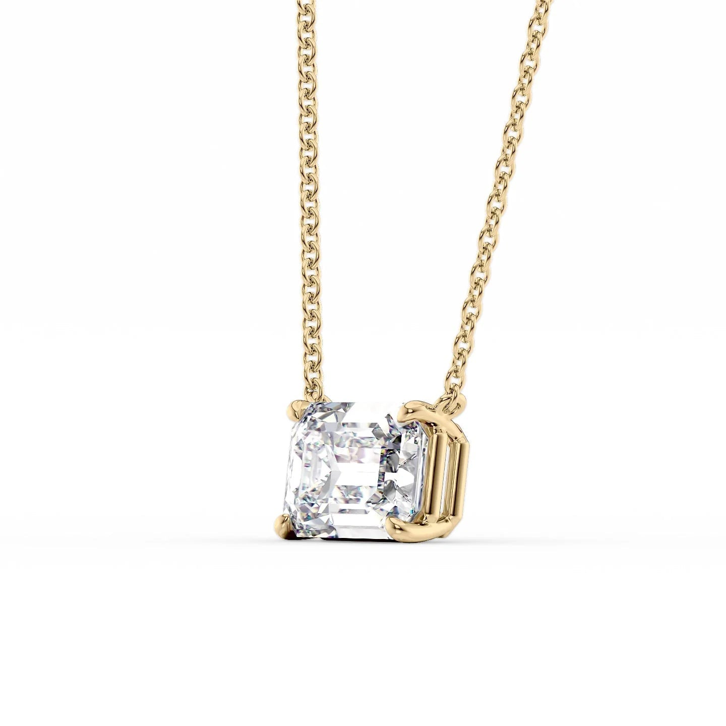 yellow :: 0.5 carat emerald solitaire necklace with rich gold styling