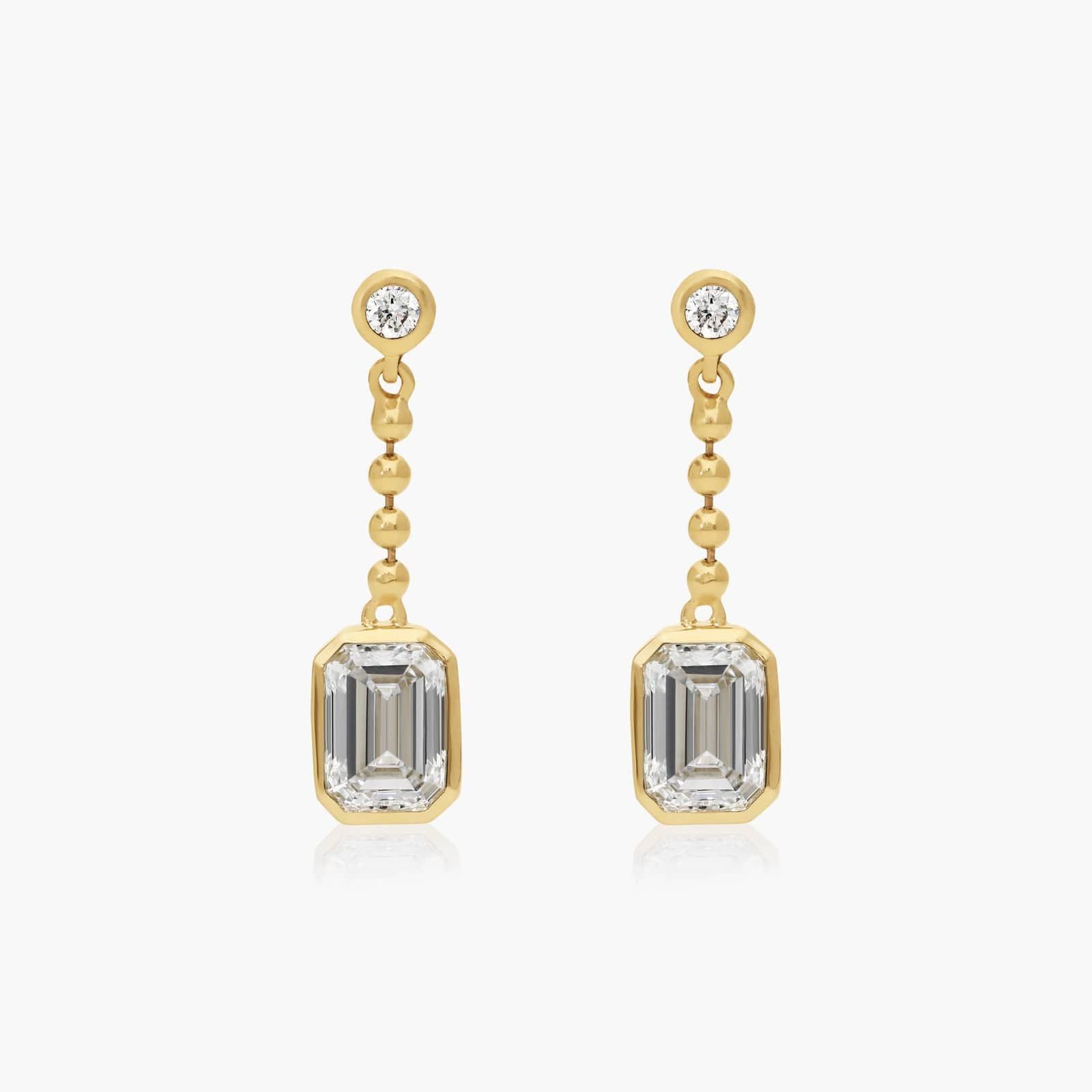 Common :: emerald cut lab grown diamond bezel chain drop earrings rectangular step cut design white gold modern fine jewelry
