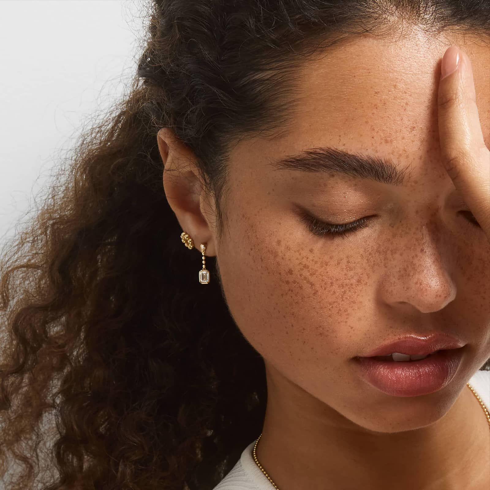 Common :: bezel set emerald shape lab grown diamond chain earrings sleek drop style white gold minimal luxury jewelry
