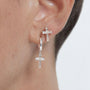 Yellow :: modern lab grown diamond cross huggie earrings pave style white gold clean minimal jewelry