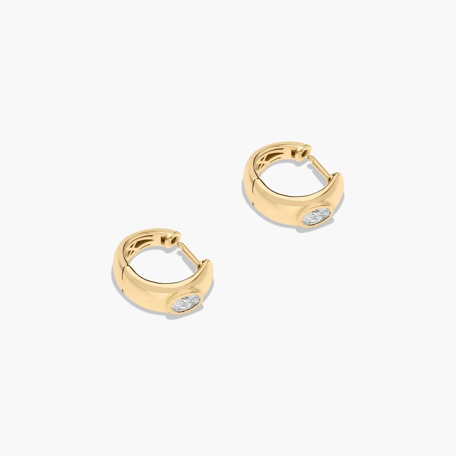 Yellow :: refined oval bezel lab grown diamond huggie earrings white gold minimal everyday jewelry