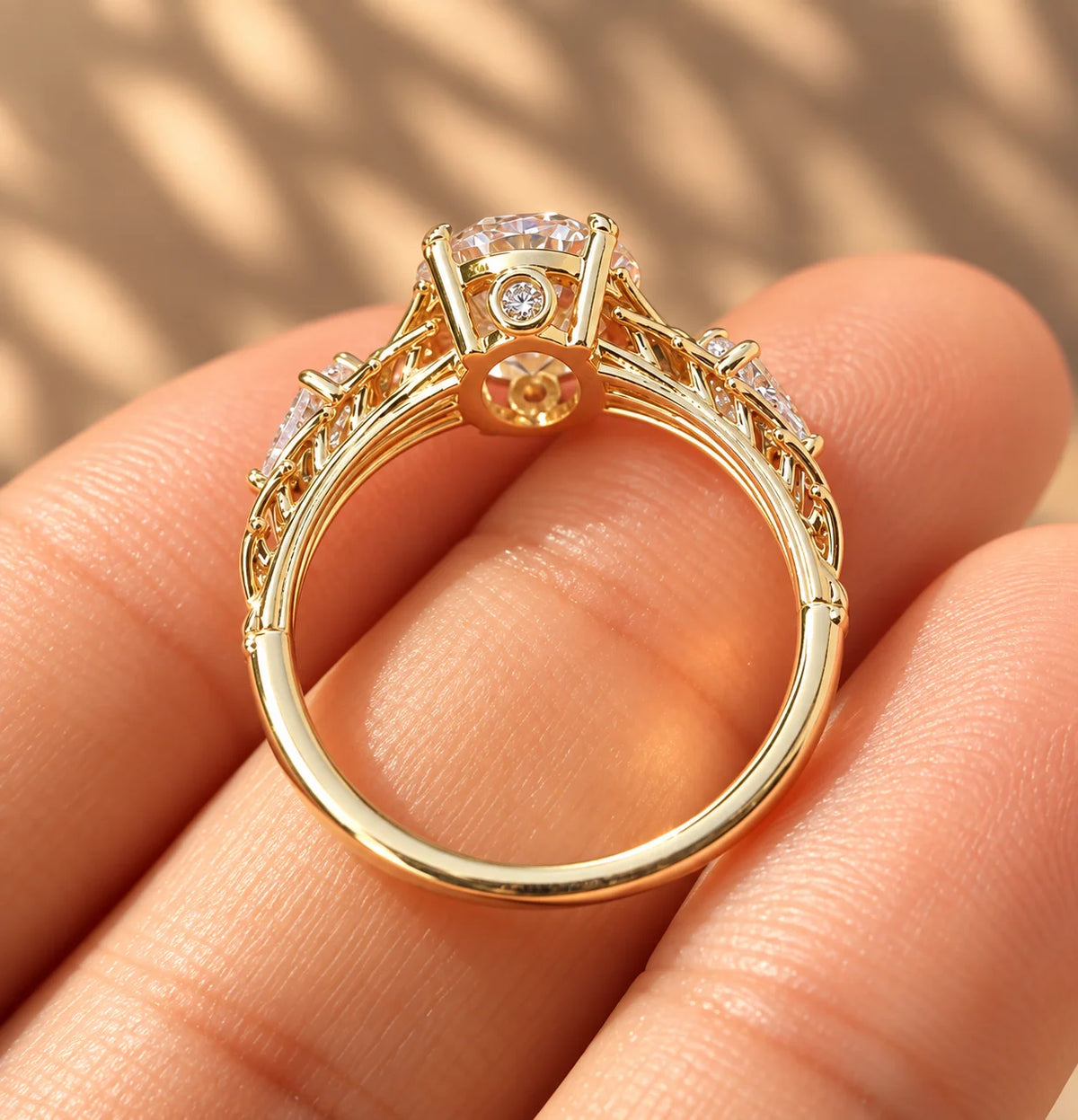 Common :: Three Stone Oval diamond ring with sculptural leaf inspired shoulders