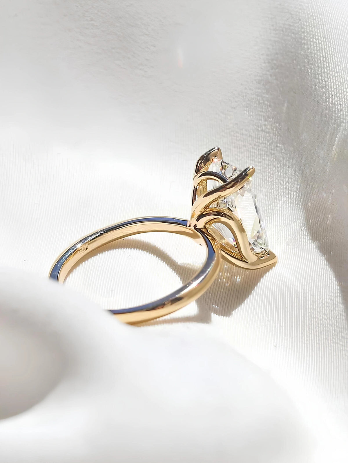 Common :: Marquise diamond engagement ring with V shaped bypass inspired band