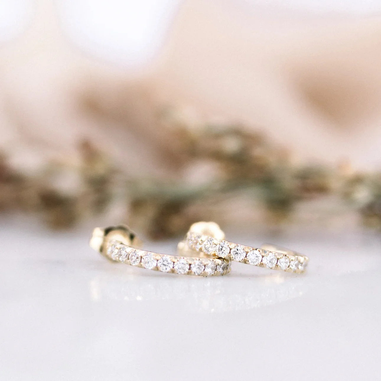 J HUGGIE HOOP EARRINGS