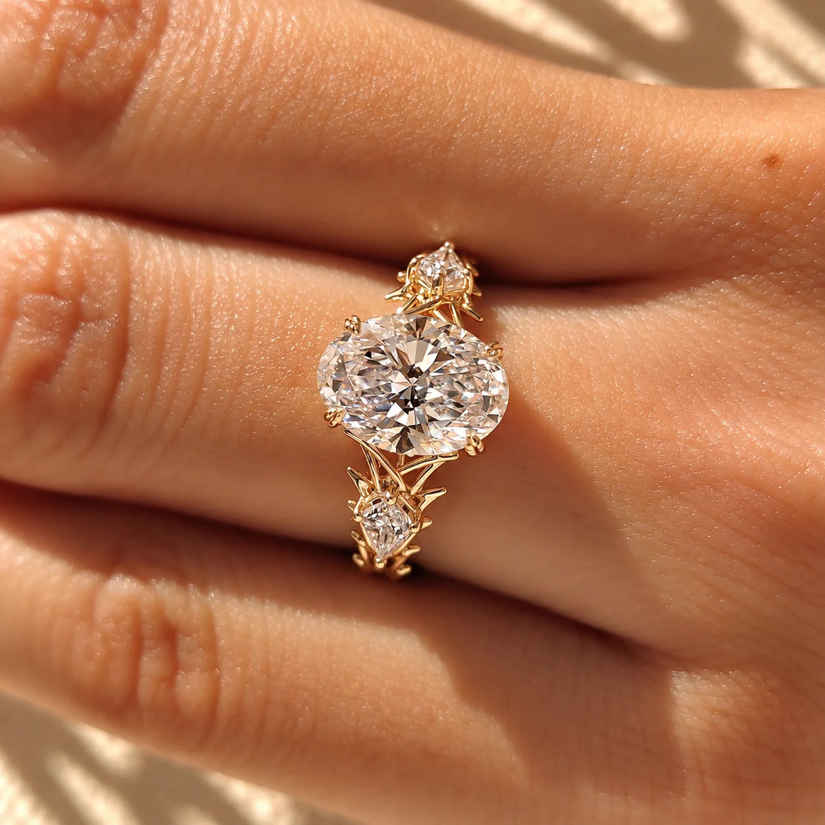 Common :: Nature inspired Oval diamond ring with two Pear accent diamonds