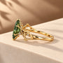 Common :: Green Marquise nature inspired ring with D E F diamond accents