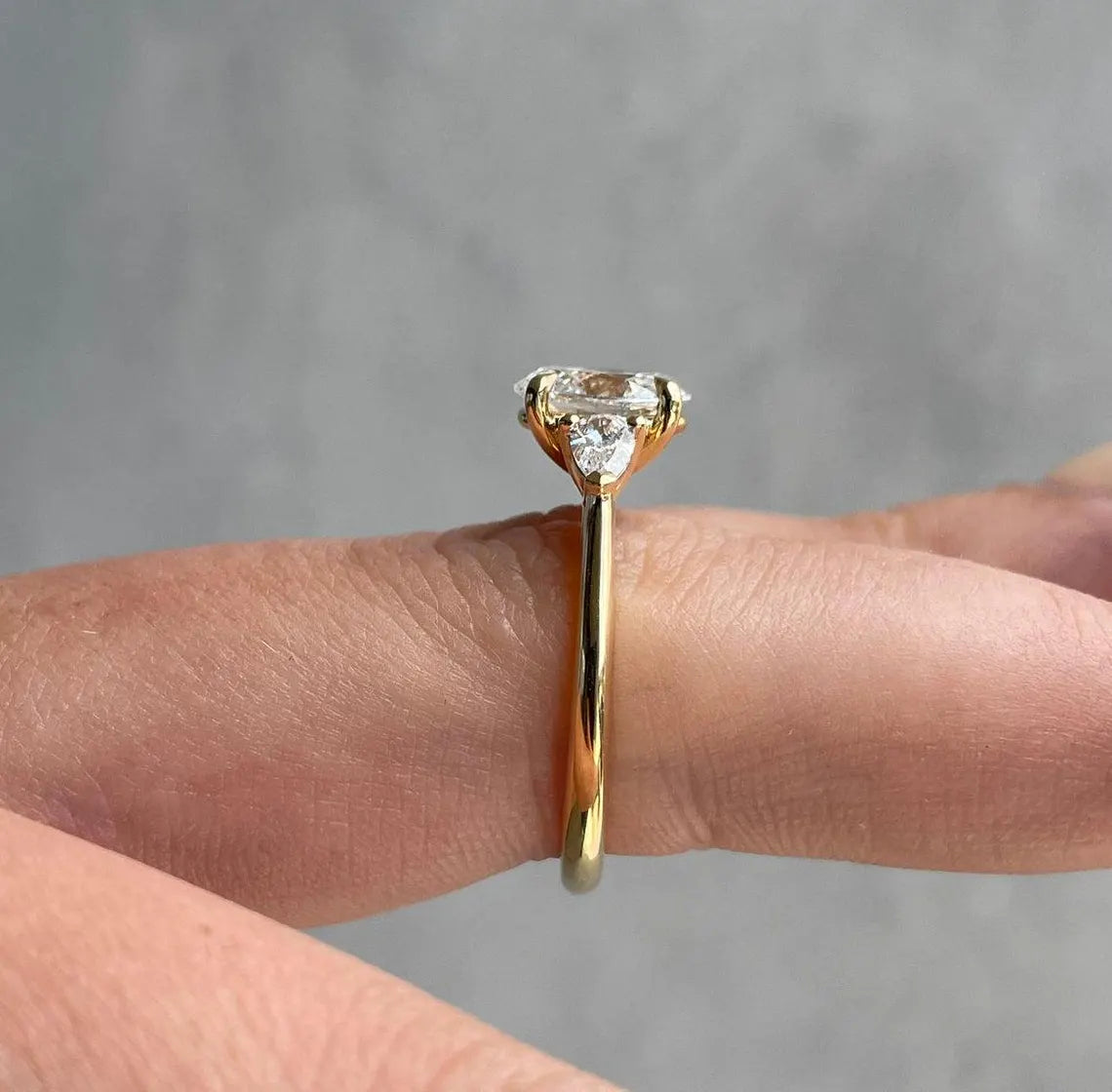 Oval 2.00tcw Lab Diamond Three Stone Ring with Pear Sides | IGI Certified | D-E-F VVS–VS