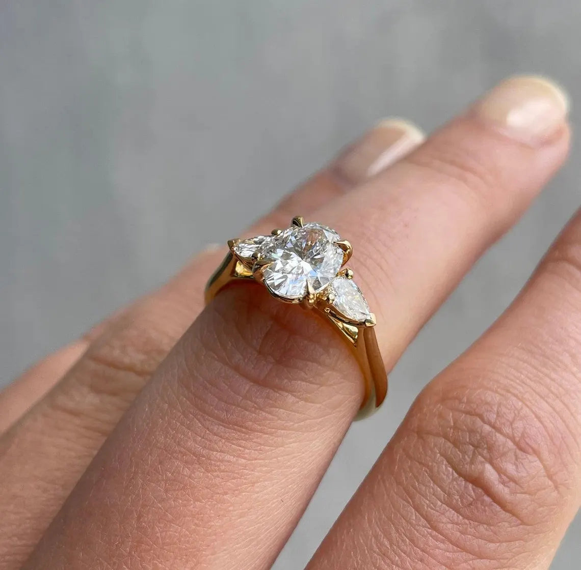 Oval 2.00tcw Lab Diamond Three Stone Ring with Pear Sides | IGI Certified | D-E-F VVS–VS