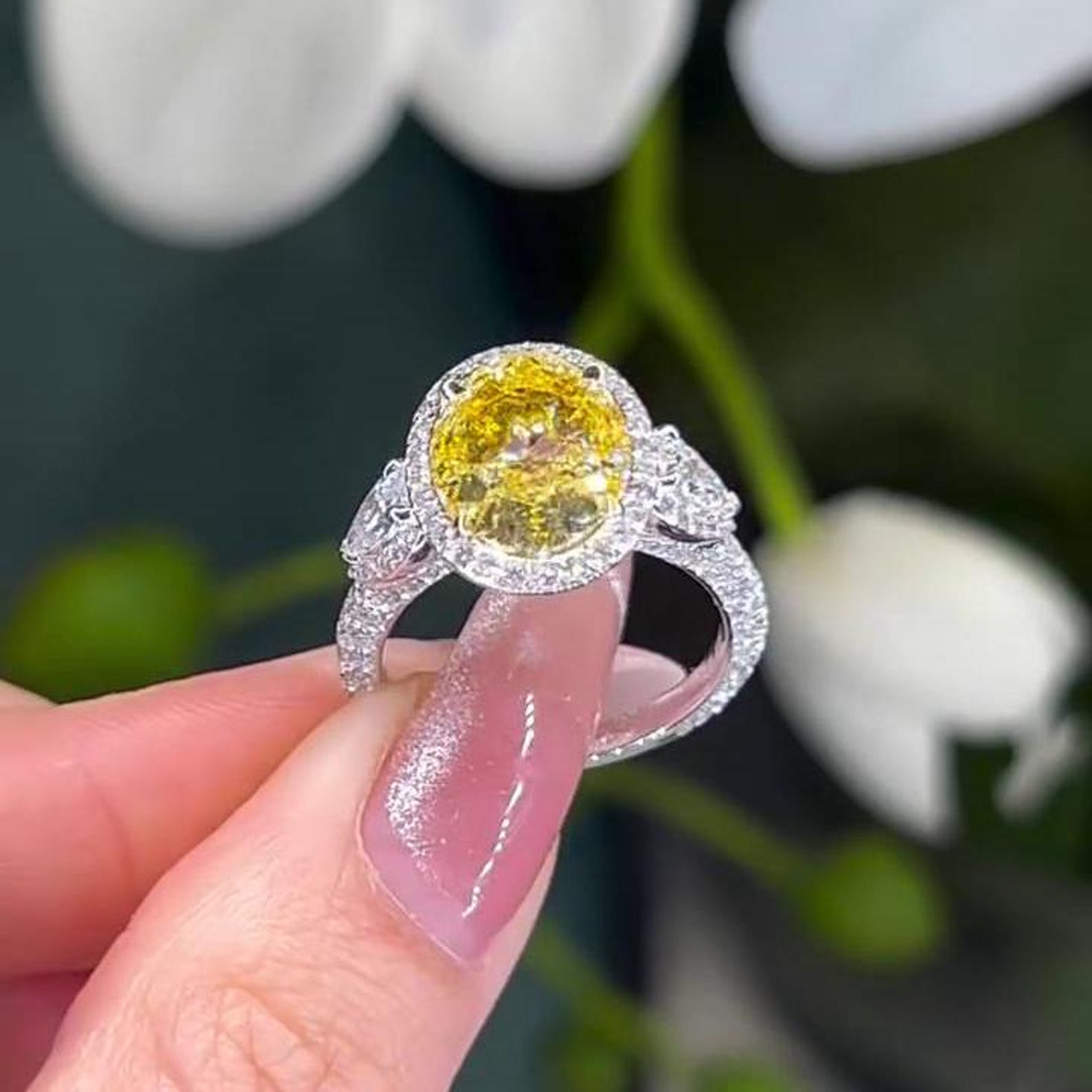 Oval Fancy Yellow 7.40tcw Lab Diamond Halo Three Stone Ring | IGI Certified VVS-VS Clarity