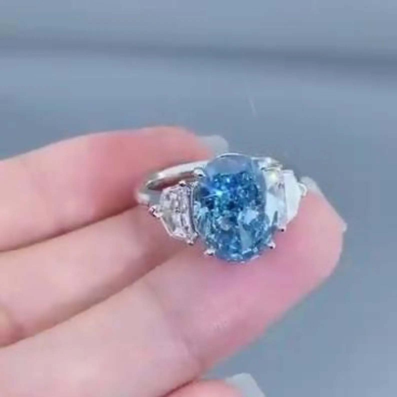 Oval 5.00tcw Fancy Blue Lab-Grown Diamond Engagement Ring | 3-Stone Style | IGI Certified