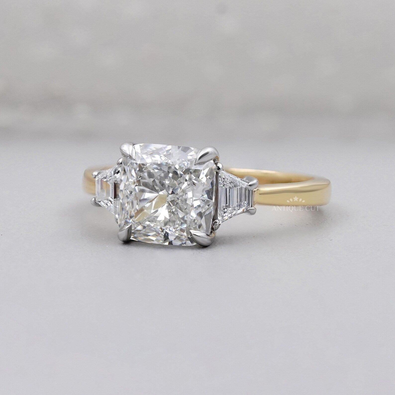 Cushion Cut 3.10tcw Lab-Grown Diamond Three-Stone Ring | Baguette Side Stones | Two-Tone Gold Setting | IGI Certified