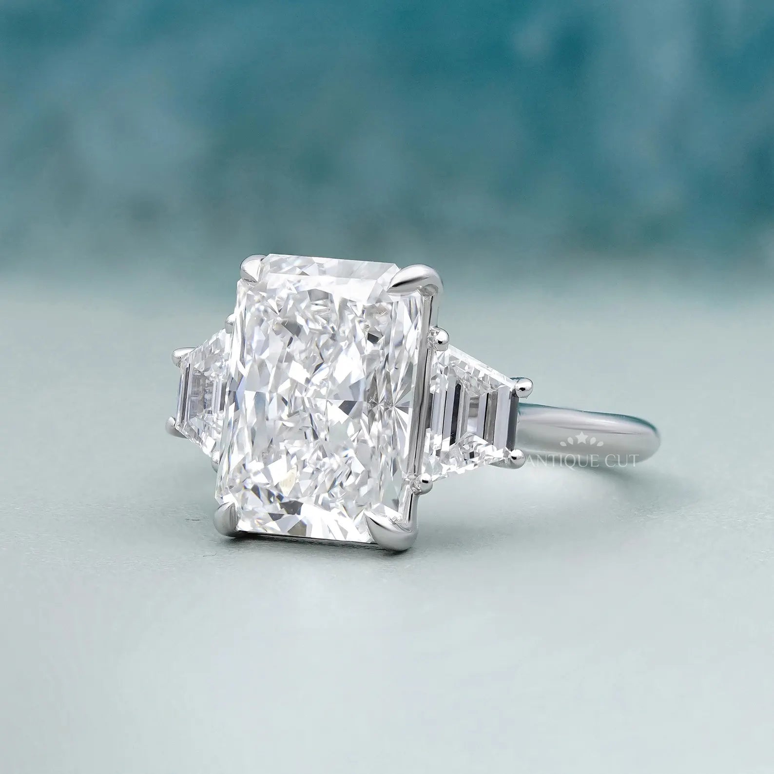 Radiant 5.97tcw Lab Grown Diamond Three-Stone Engagement Ring | Trapezoid Side Stones | D–F Color | VVS–VS Clarity
